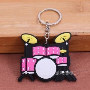 Брелок резиновый Ударная установка. Цвет розовый.